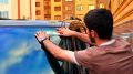 В День Государственного флага Республики Ингушетия активисты Молодежного совета при главе города Магас организовали акцию по размещению символики на автомобилях